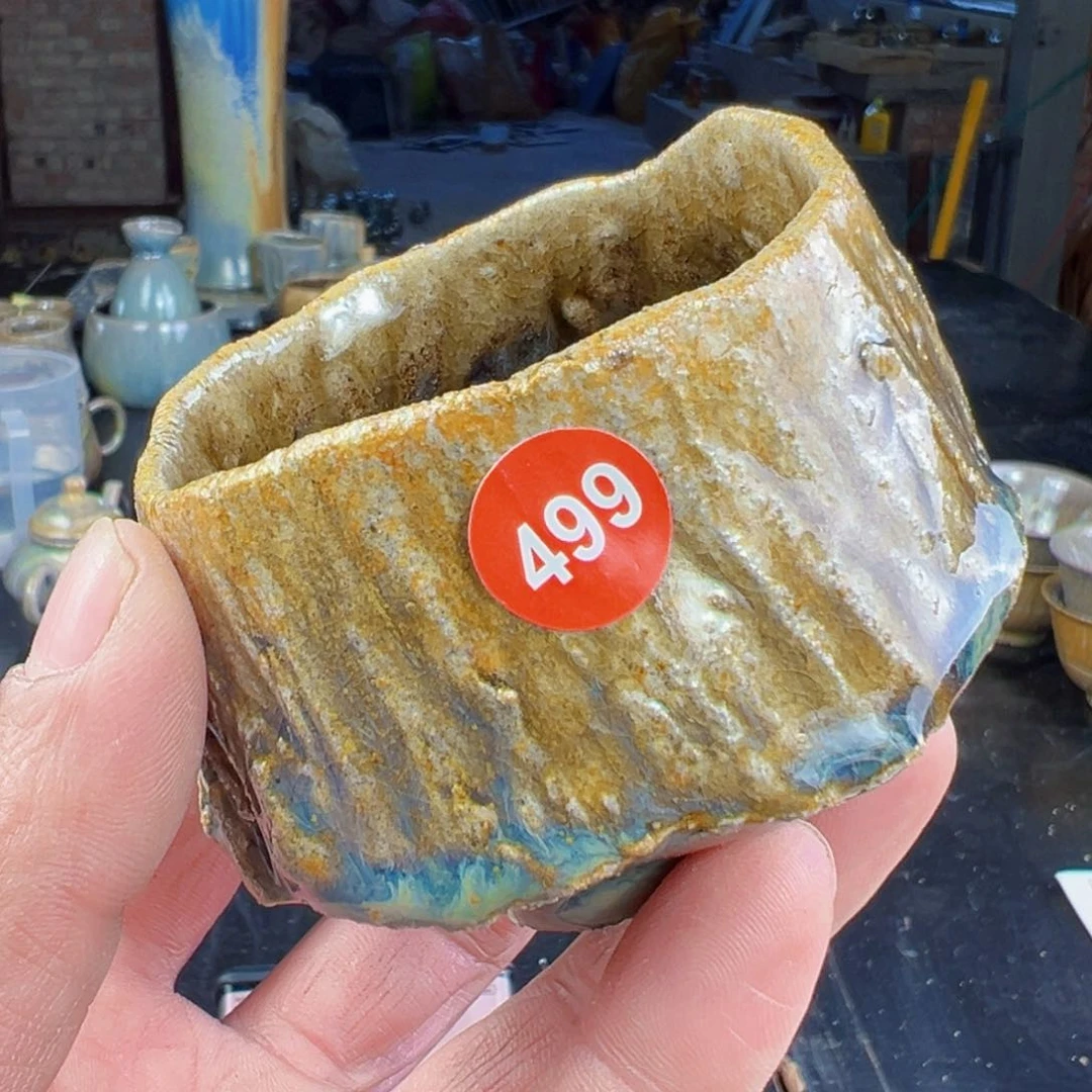 杯c****B499号郝老师手捏柴烧杯拍价