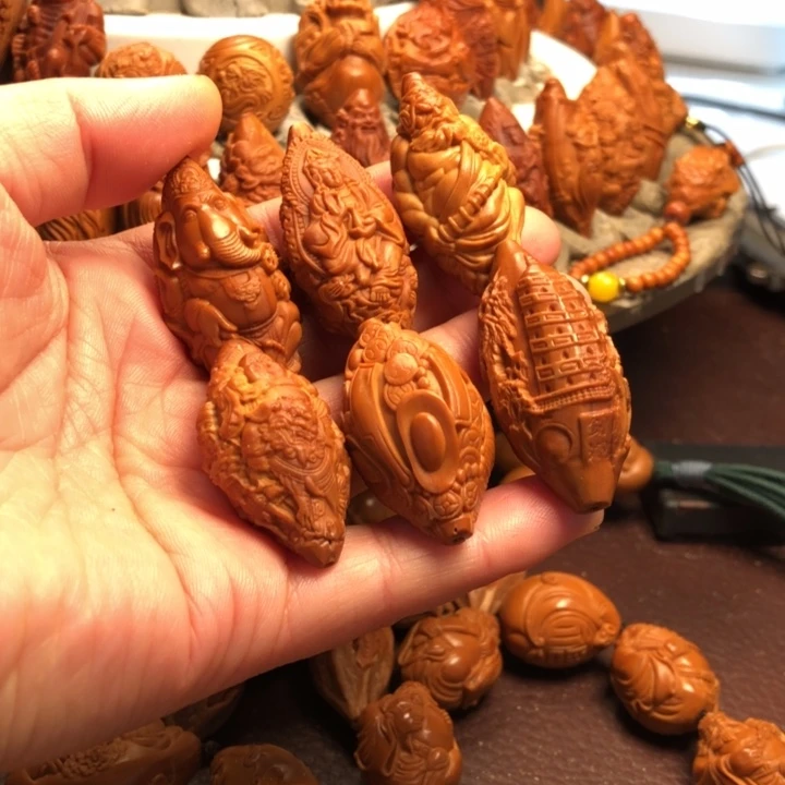 全***告橄榄核吊坠橄榄核雕刻的手串