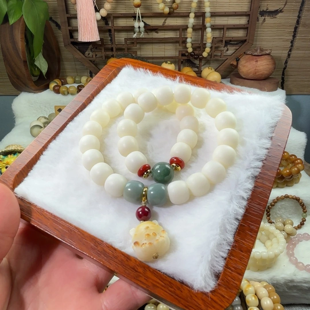 菩提根/象牙果手串来****觉卡12小白兔双圈
