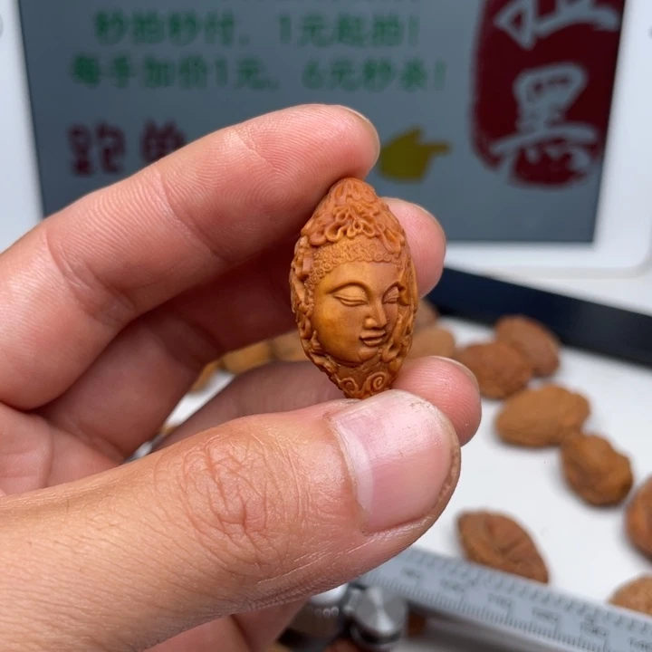 橄榄核吊坠橄榄核雕刻单子。