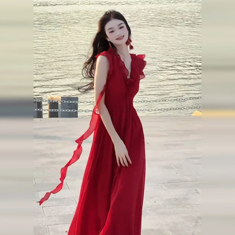 法式气质绿色小飞袖连衣裙子女夏季2025新款海边度假漂亮掐腰长裙
