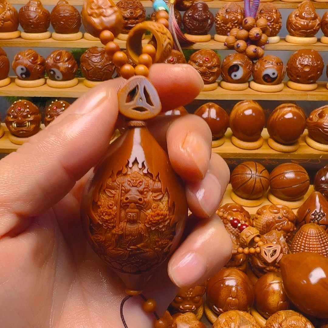 乐***呀橄榄核手串/手链牛守护激光