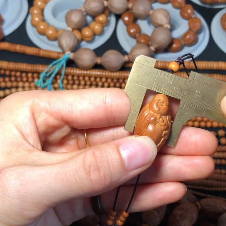 阳***亿橄榄核手串/手链弥勒