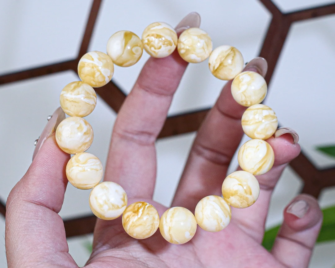 19.99 13+mmO琥珀蜜蜡白蜡虎皮圆珠手串 颗颗精选，花纹漂亮