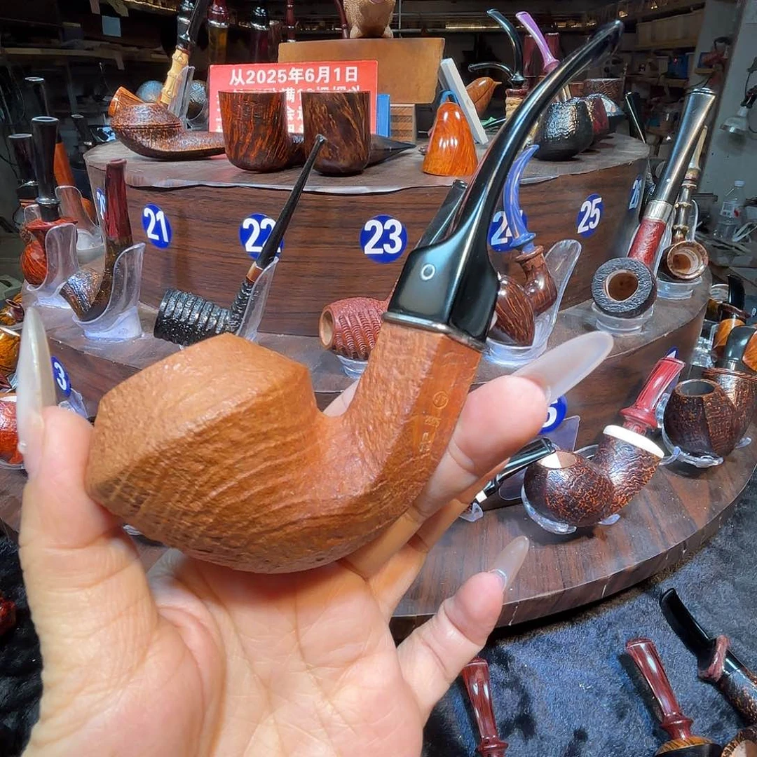 明**身焦耀烟斗一大牛头