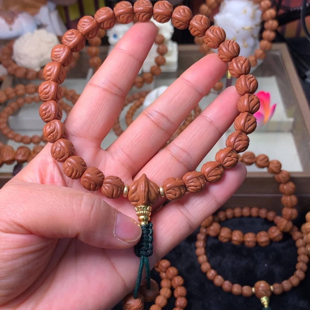 今***缘桃核吊坠双脊龙手持10