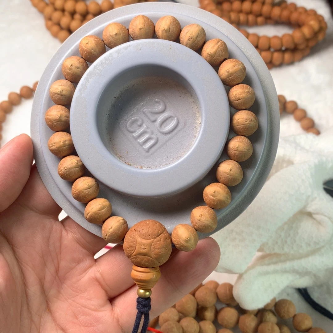 鱼***书凤眼菩提手串11实心飞碟