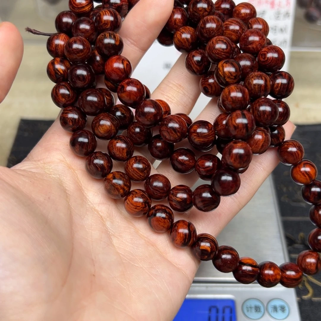 小***姥木红降10-108圆珠黑金满油多圈（瑕疵）