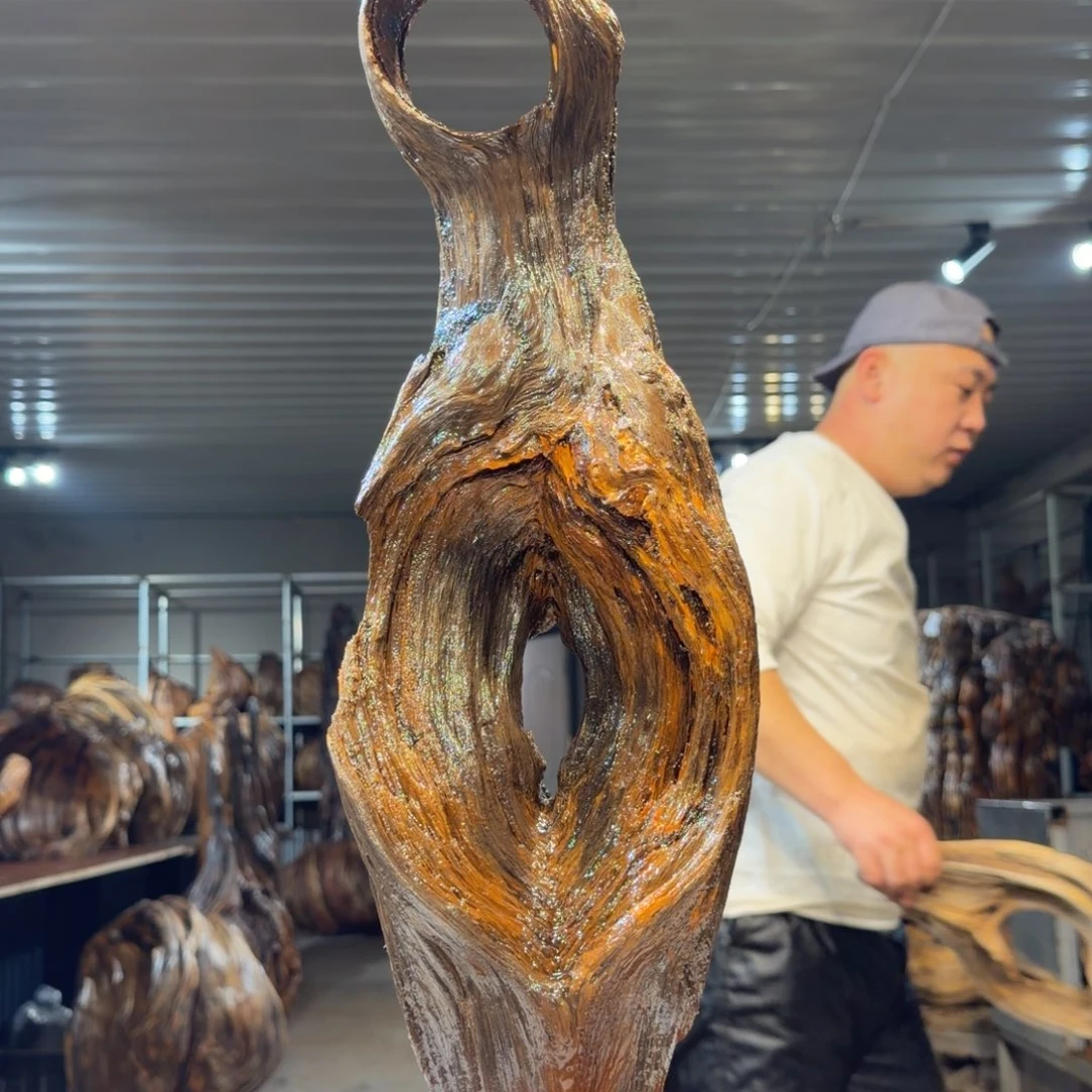 含***含木王一刀琥珀木摆件B49