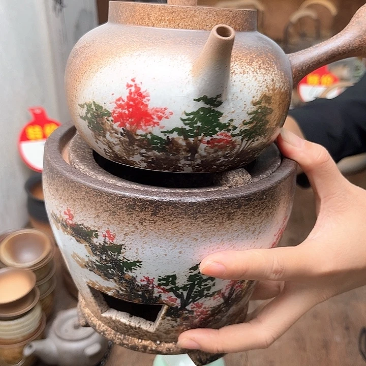 珊瑚花侧把壶一个加珊瑚花炭炉一个。。