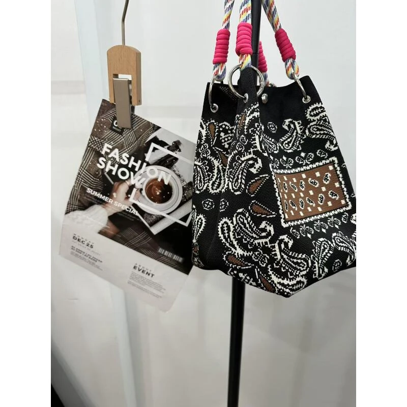 春季新款ins风花朵针织手提包女时尚出游拍照手拎包水桶包大容量