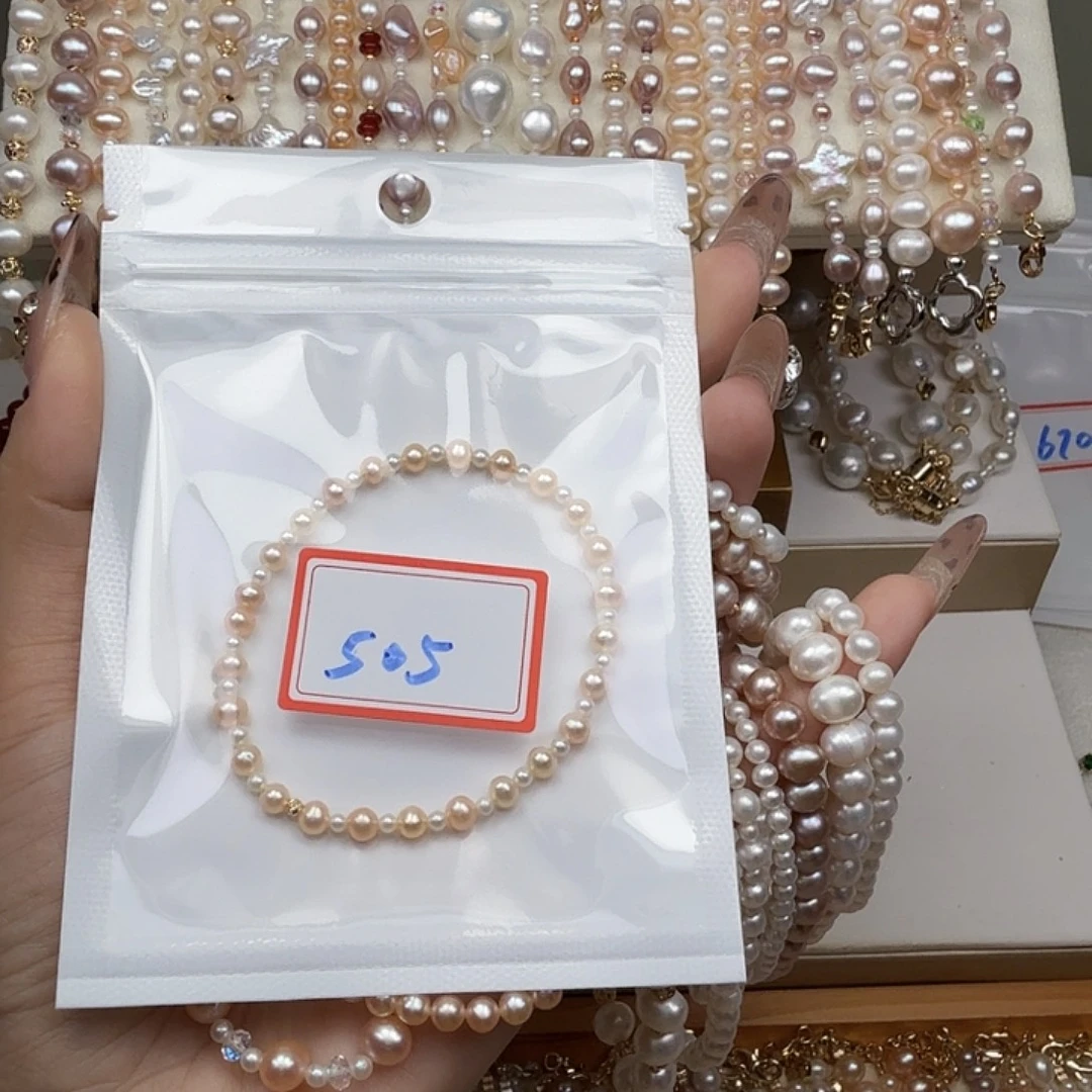 美***啰淡水珍珠手绳钛钢