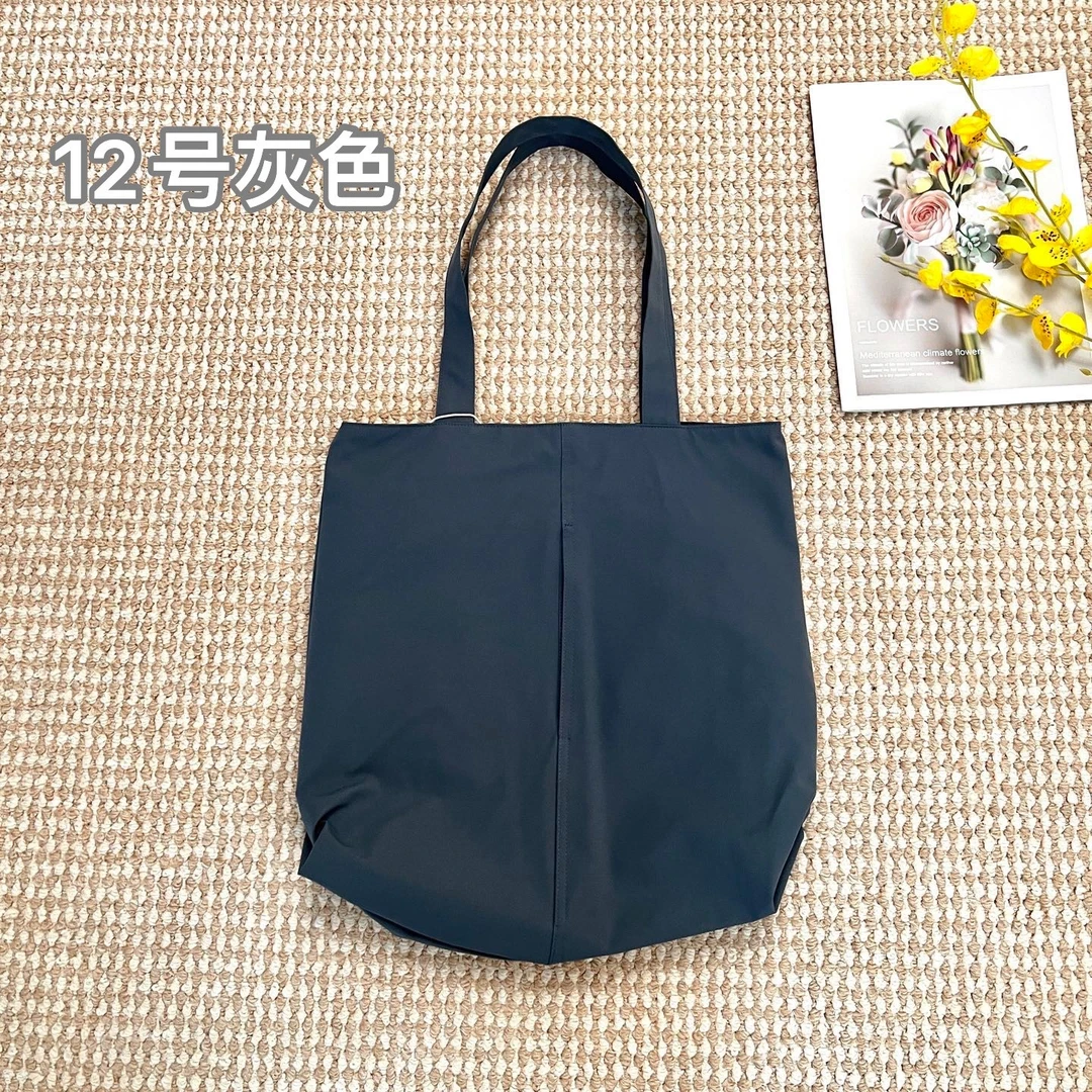 女士休闲时尚百搭单肩托特妈咪大容量通勤手提斜跨包50374