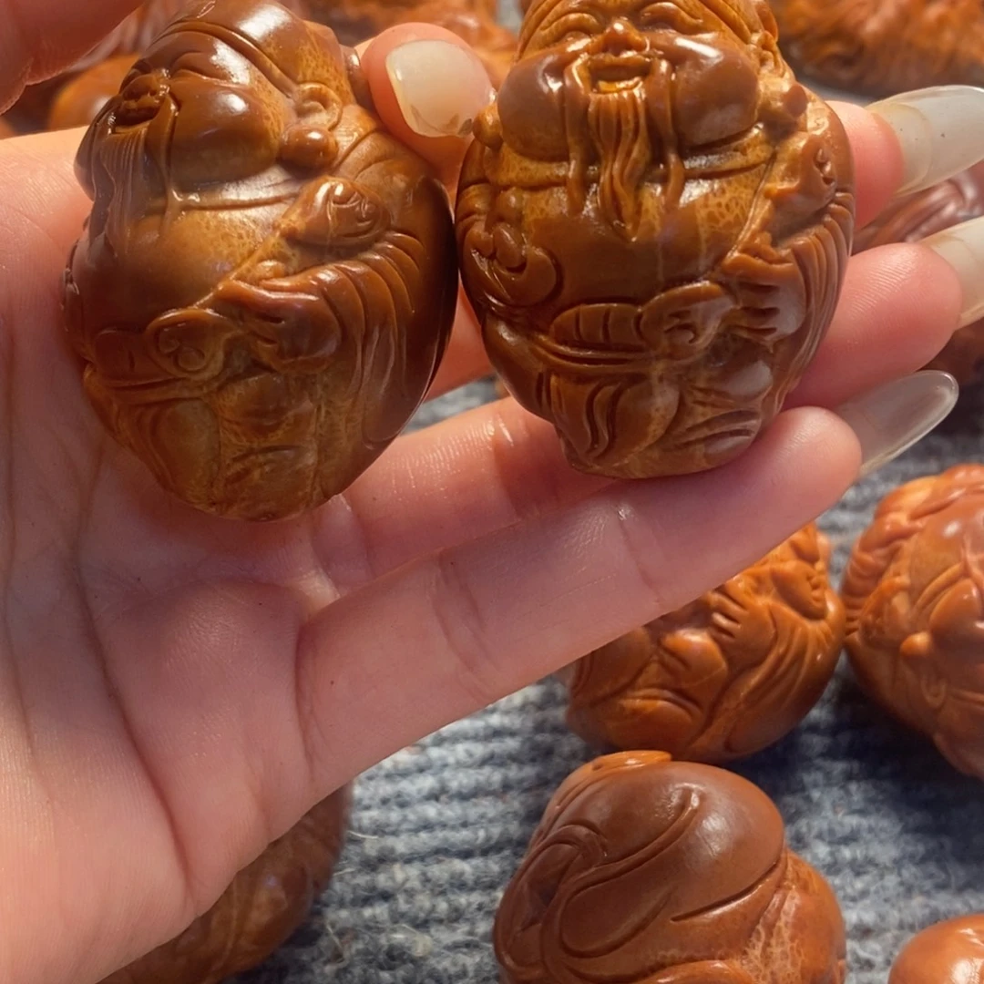 友***哥橄榄核吊坠财神一对