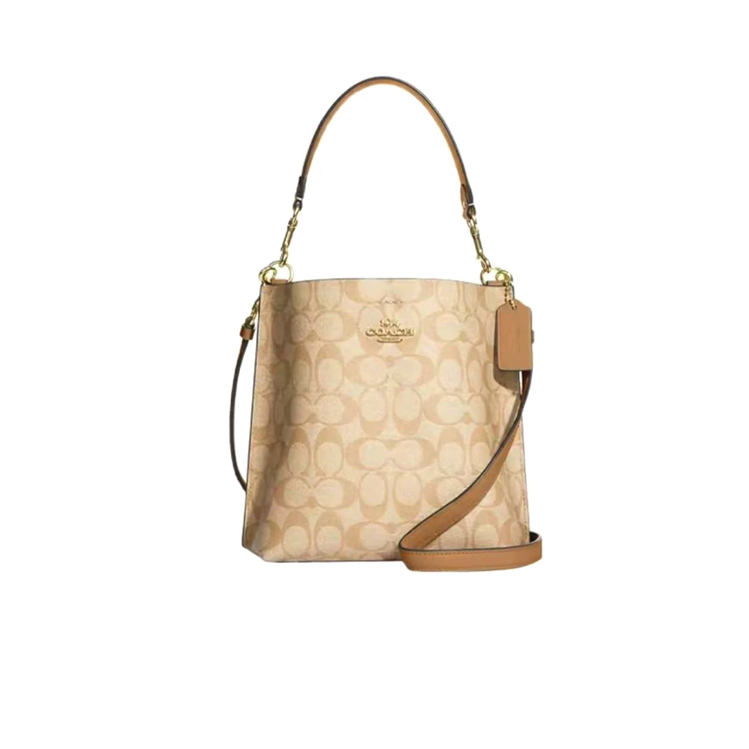 95新 COACH/蔻驰 奶茶色老花棕底水桶包/H7109/20X21X10