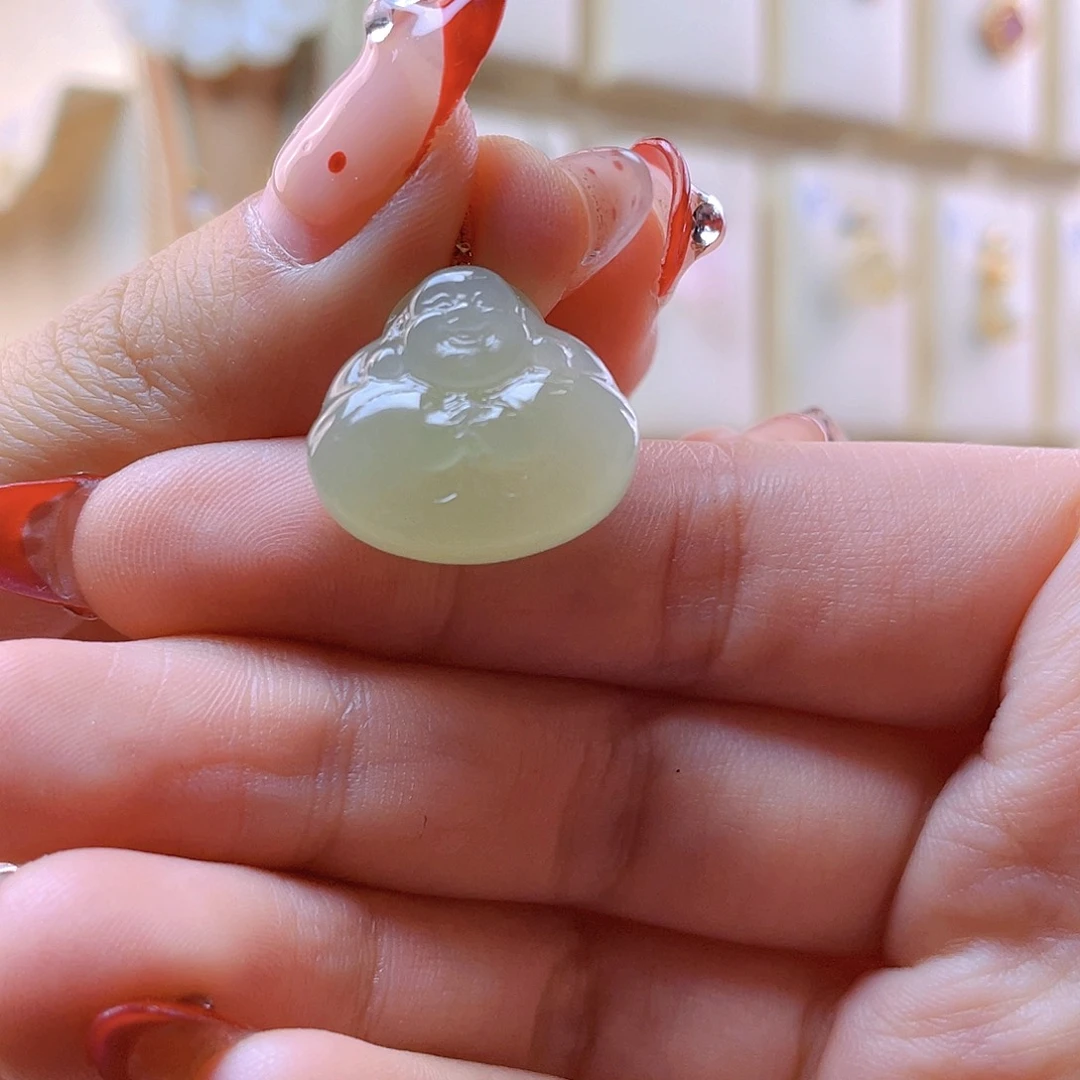 和田玉吊坠(赠链)18K金镶嵌丁****?