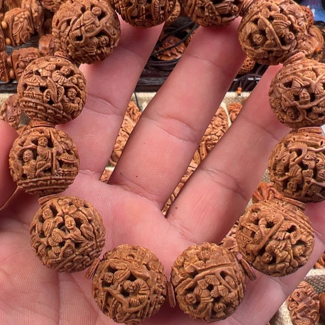 桃核吊坠桃核雕刻镂空八人雕