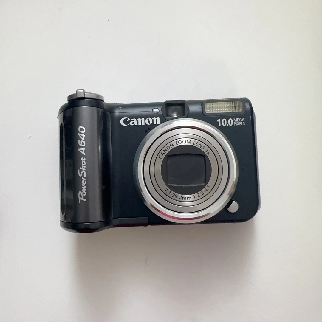 95新 Canon/佳能 A640 自备四节五号电池伸缩镜头冷白皮CCD翻转屏