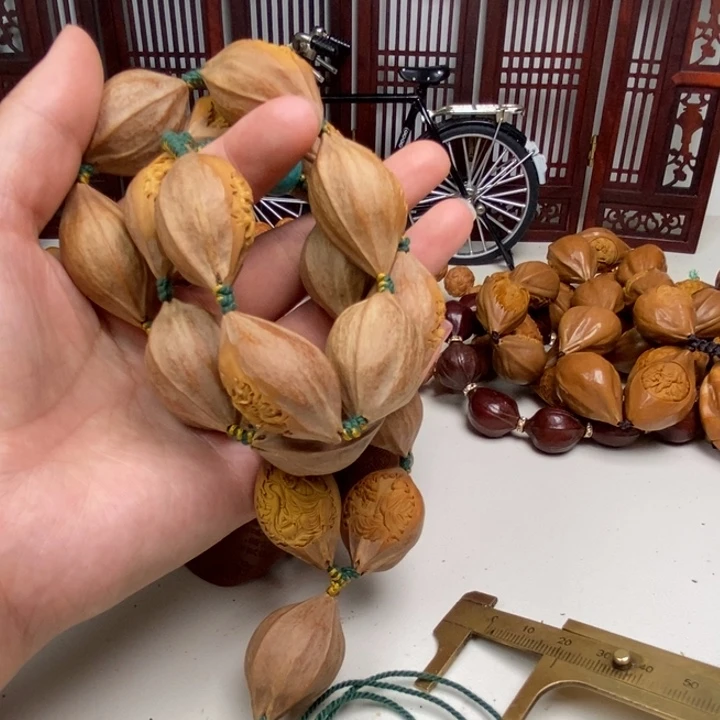 猴头核桃吊坠罗汉包衣