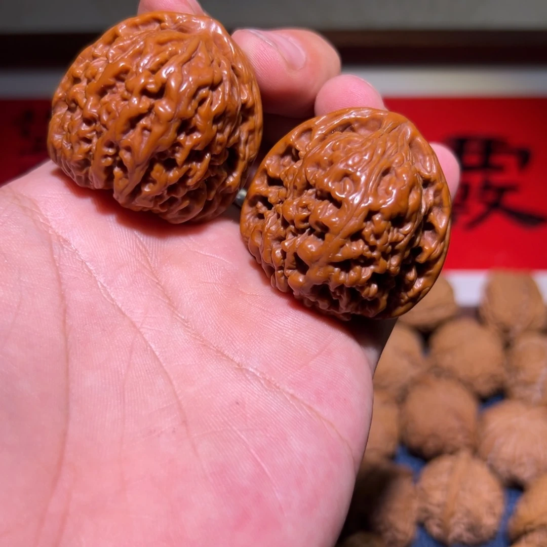 此***”文玩核桃吊坠41机刷南疆石一对