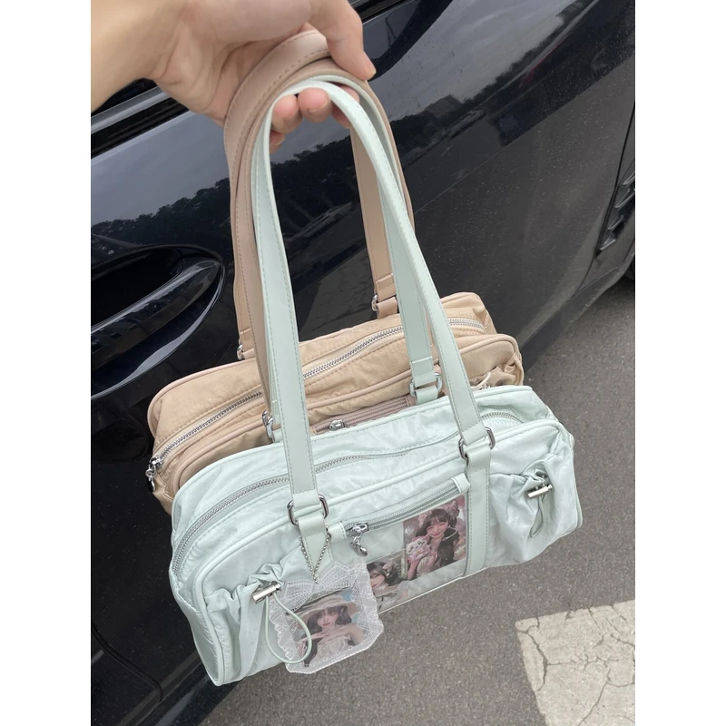 纯色简约奶薄荷尼龙包拼皮轻便休闲包时尚小食量痛包演唱会应援包