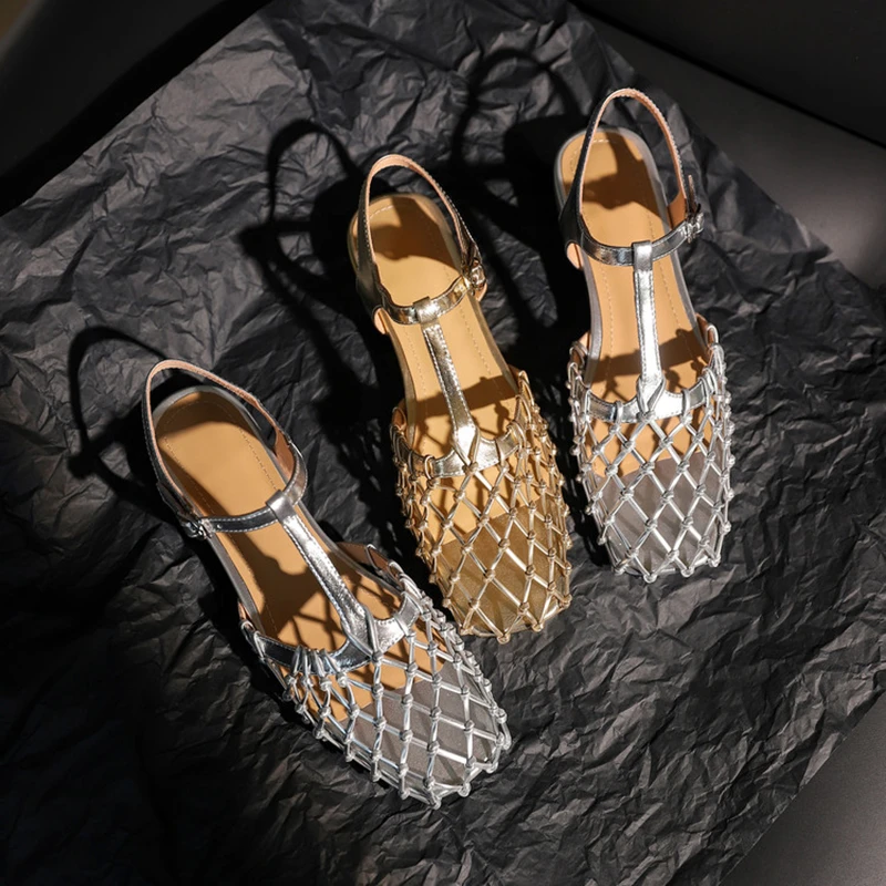 法式小众镂空编织后空猪笼鞋2025春夏新款透气网面平底罗马凉鞋女