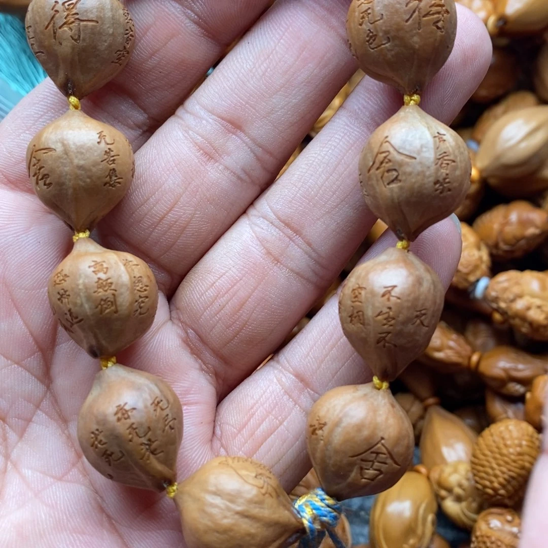 橄榄核吊坠我们的