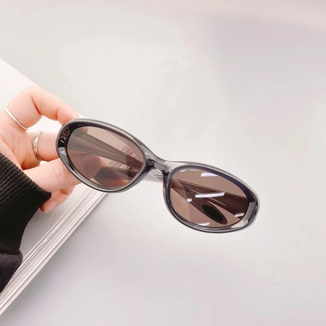 Y2K千禧辣妹未来科技感椭圆形朋克墨镜男女潮人骑行米钉太阳眼镜