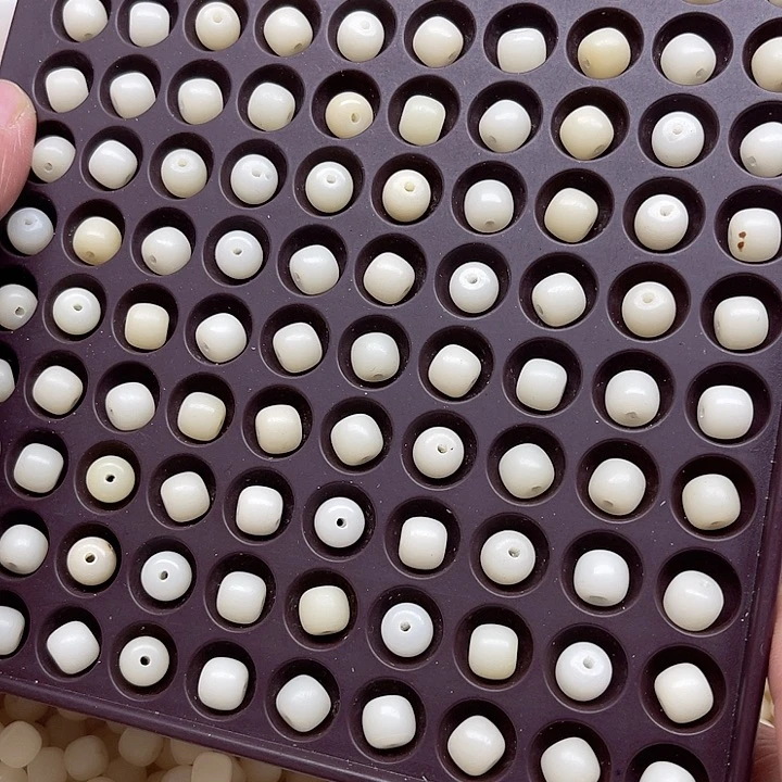 白玉菩提吊坠瑕疵9-8奶白桶珠100颗卡灯牌宠100颗