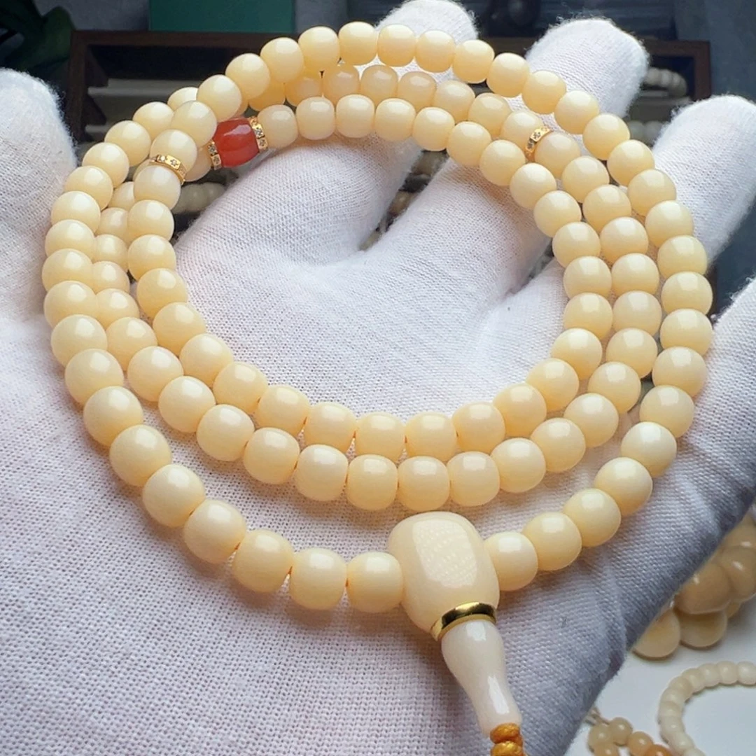 我***里菩提根/象牙果手串卡7 SSS级驼骨黄透料108 T888