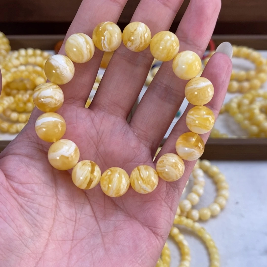 琥珀未镶嵌裸石13+皓月金白虎皮圆珠