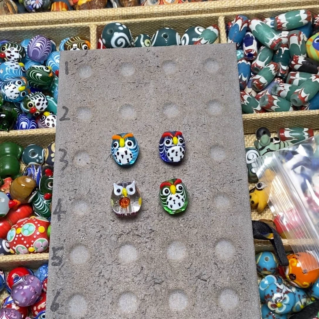 颈饰琉璃猫头鹰一家