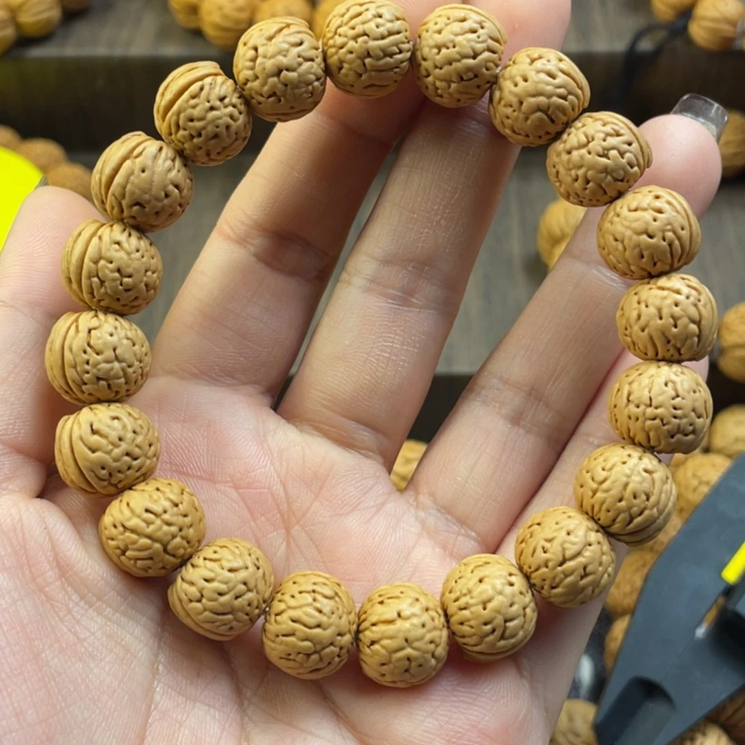 桃核手串舞**⁷野生金丹