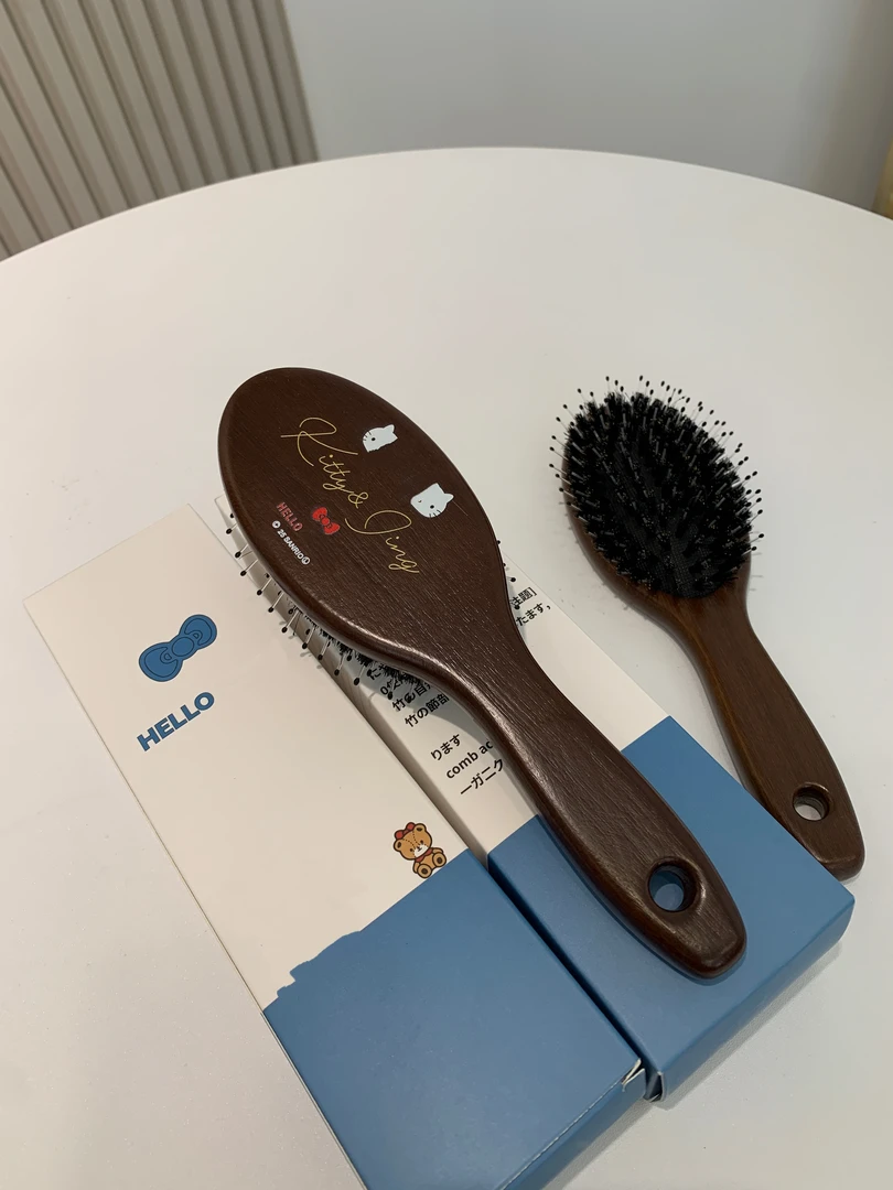 KT梳可爱猪鬃毛按摩气囊梳复古家用便携防静电梳头木梳子顺发气垫