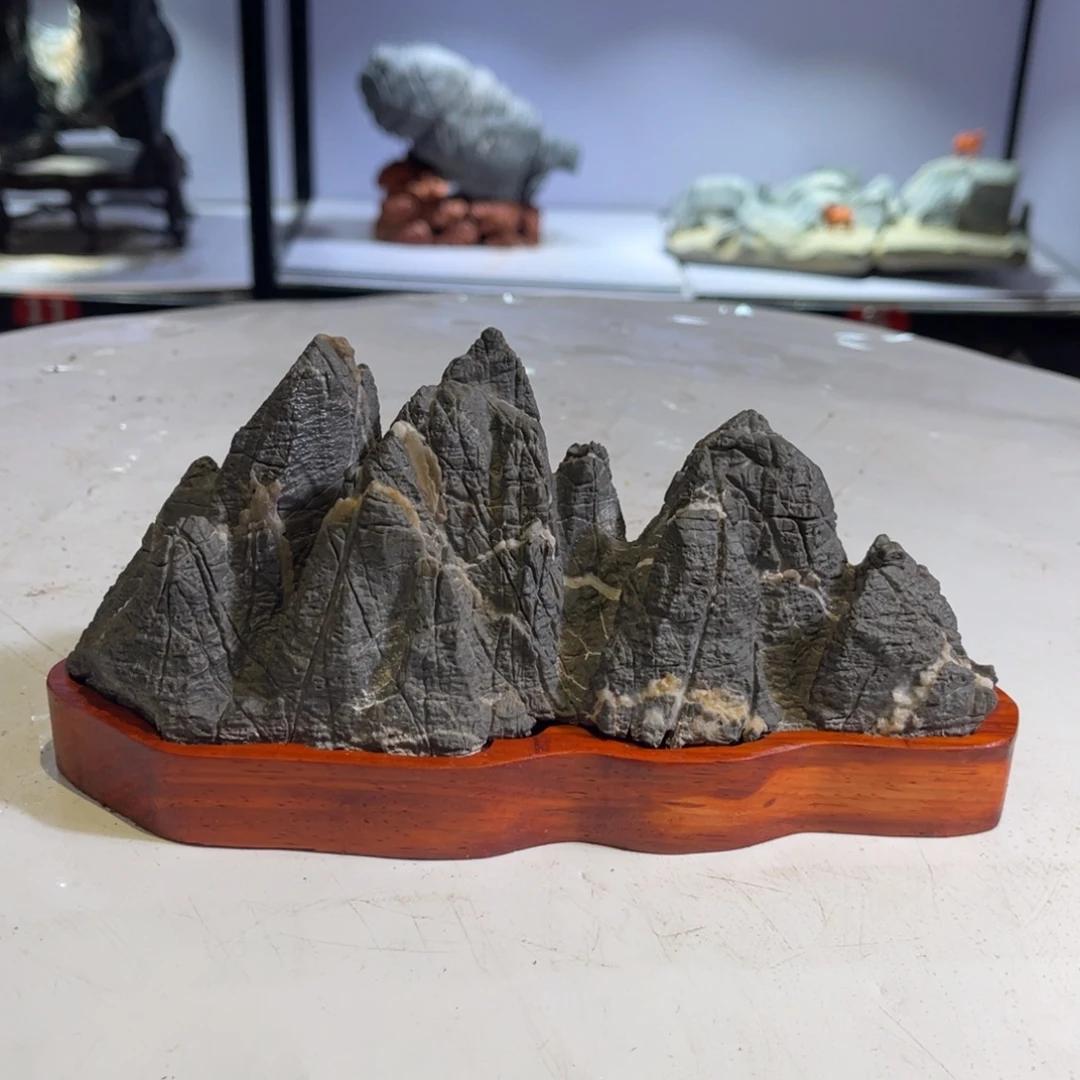 沐***杉石材灵璧奇石收藏起来了