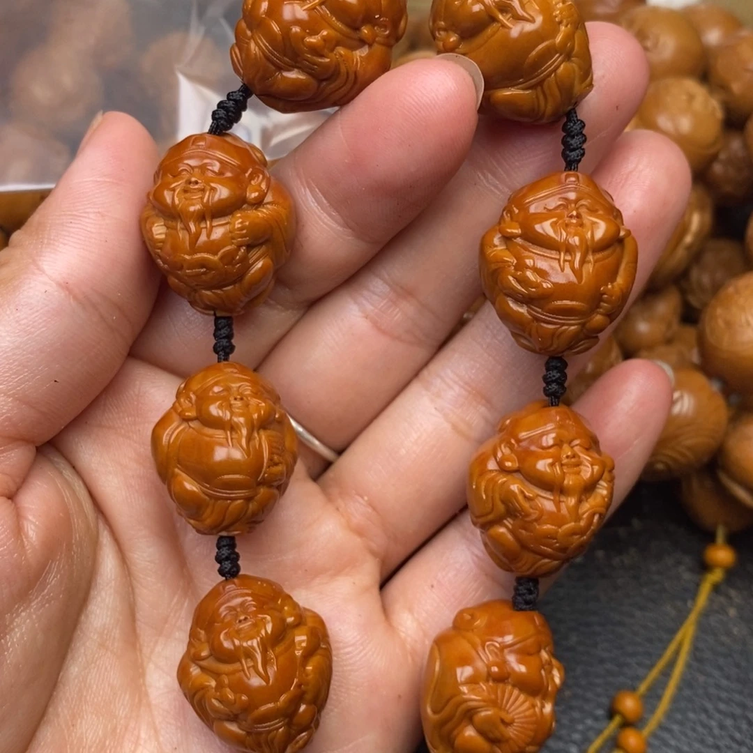 果***市手串橄榄核元甲财神色差