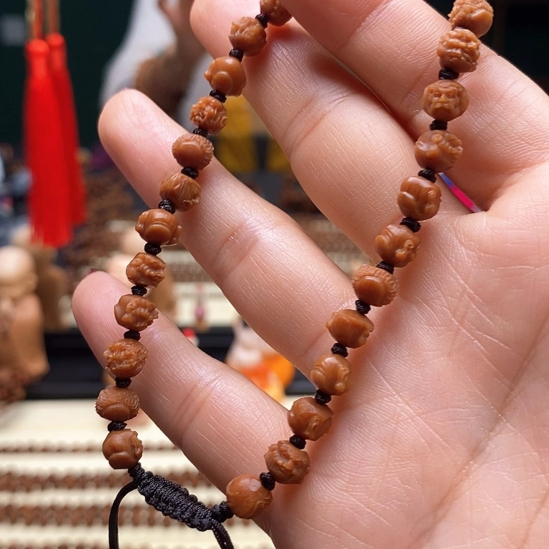 吊坠橄榄核0.7，单面罗汉36