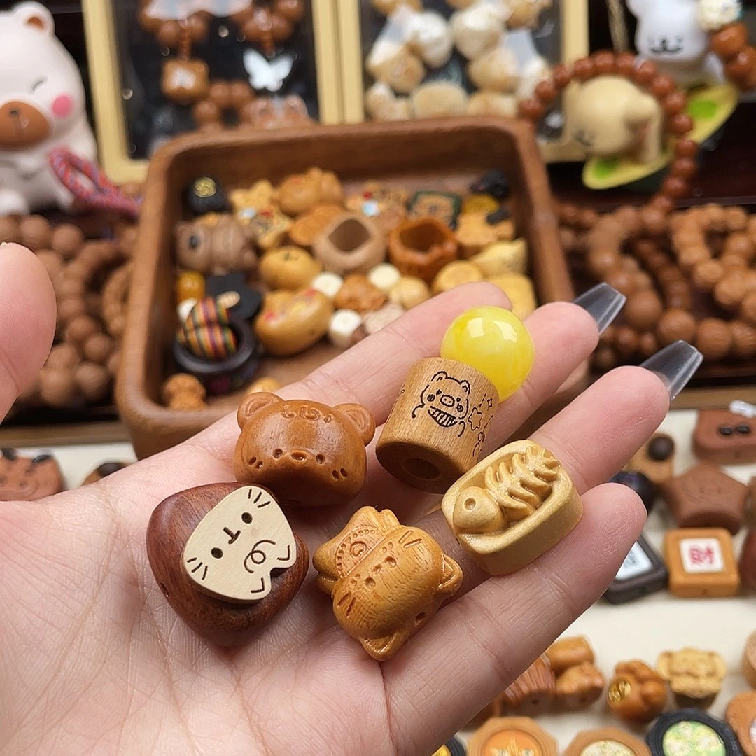 栗***奶猴头核桃吊坠配饰