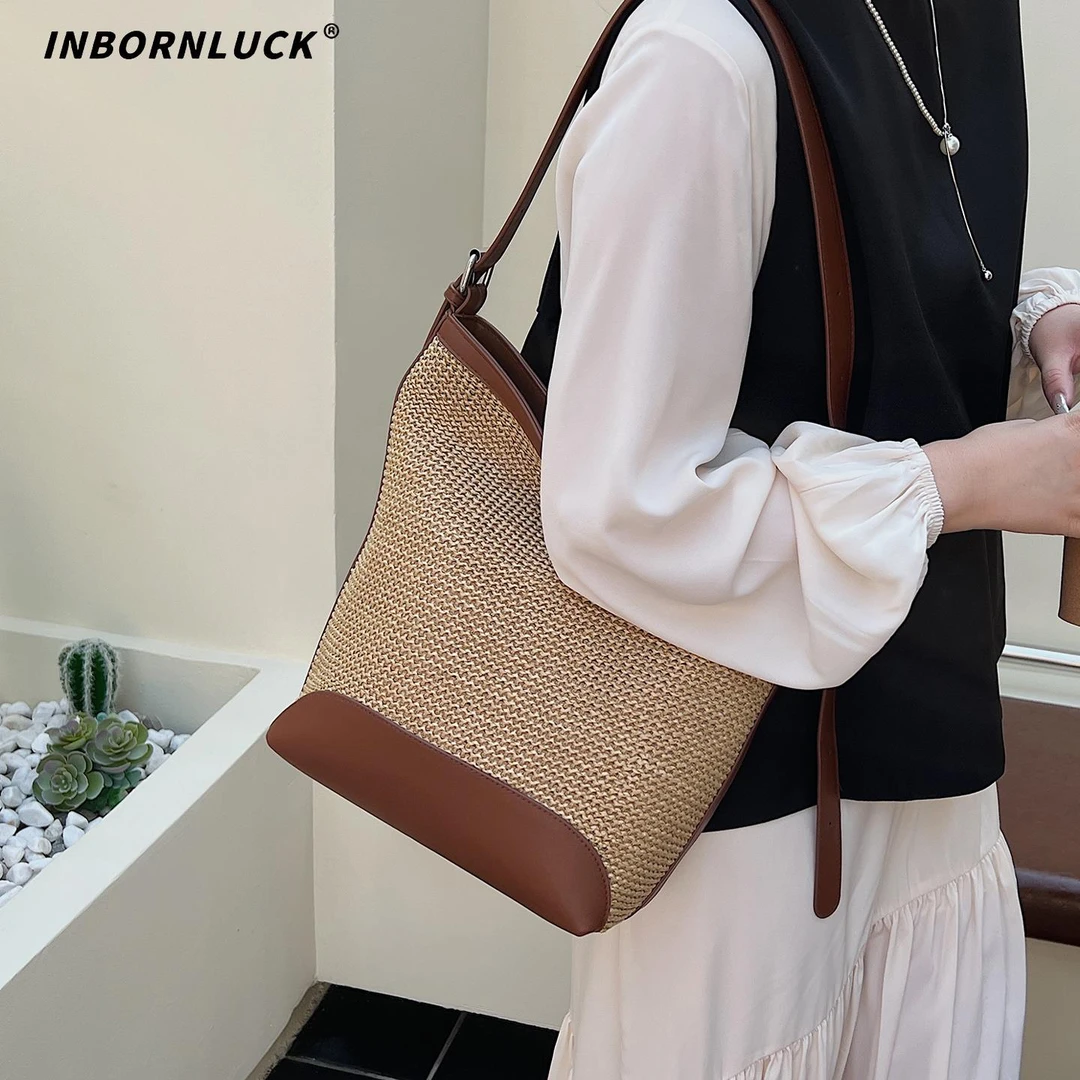 手工编织包包女2025新款潮海边度假单肩包大容量水桶包沙滩草编包