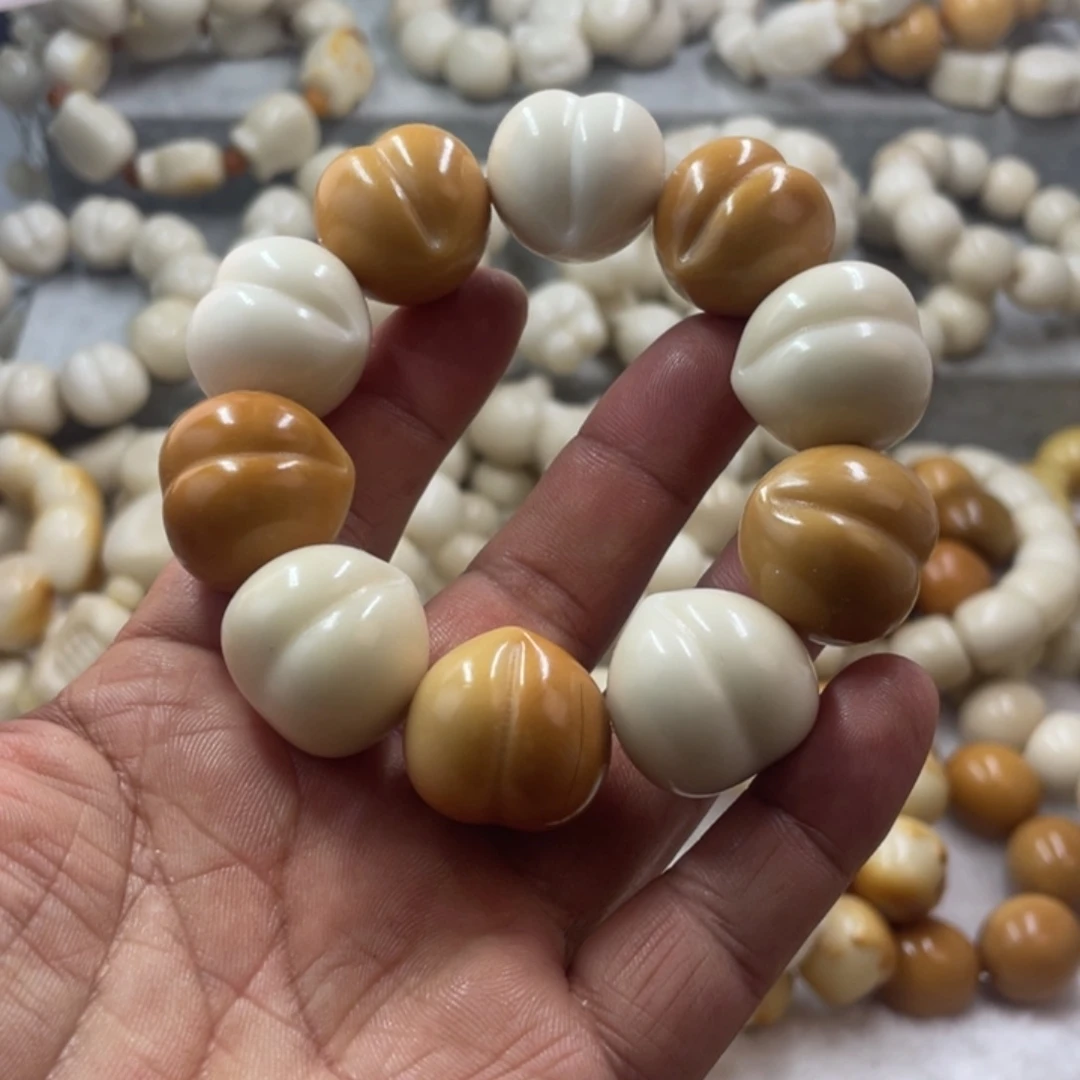 吊坠菩提根/象牙果全品象牙果桃手串卡25