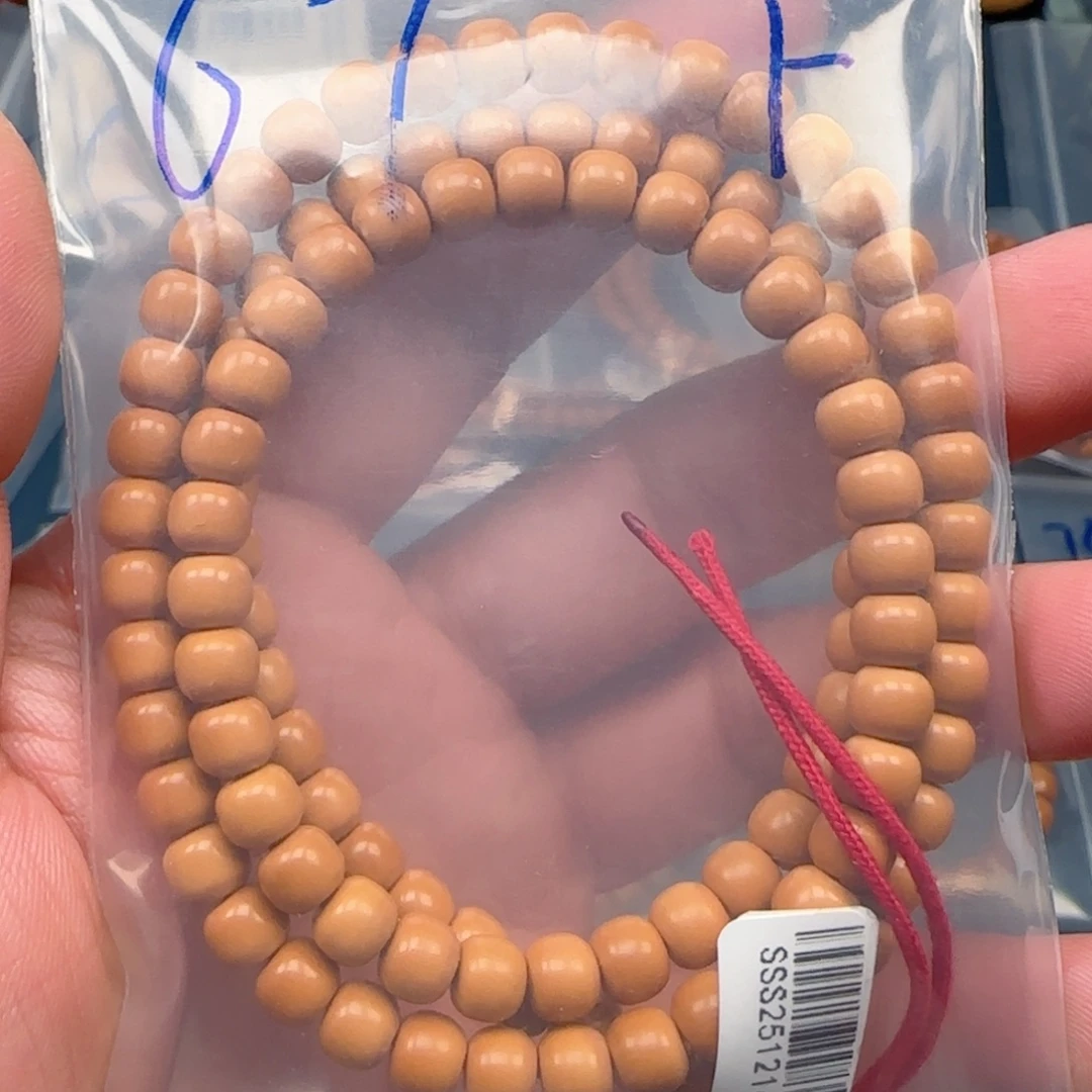 忆***^橄榄核手串老挝SS级核尖极限弧尺寸6.7全无白微变色