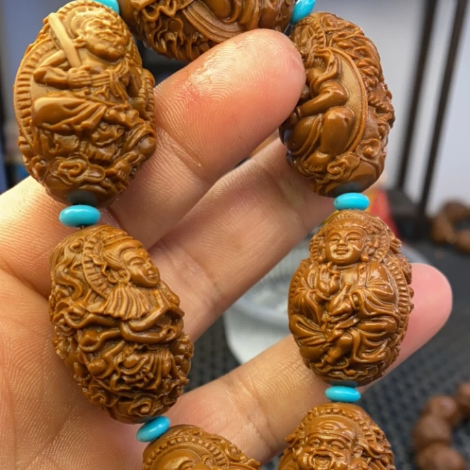 得奖的2.3.御龙万佛朝宗雕刻手串是沉水核不是橄榄核黄金树沉水核