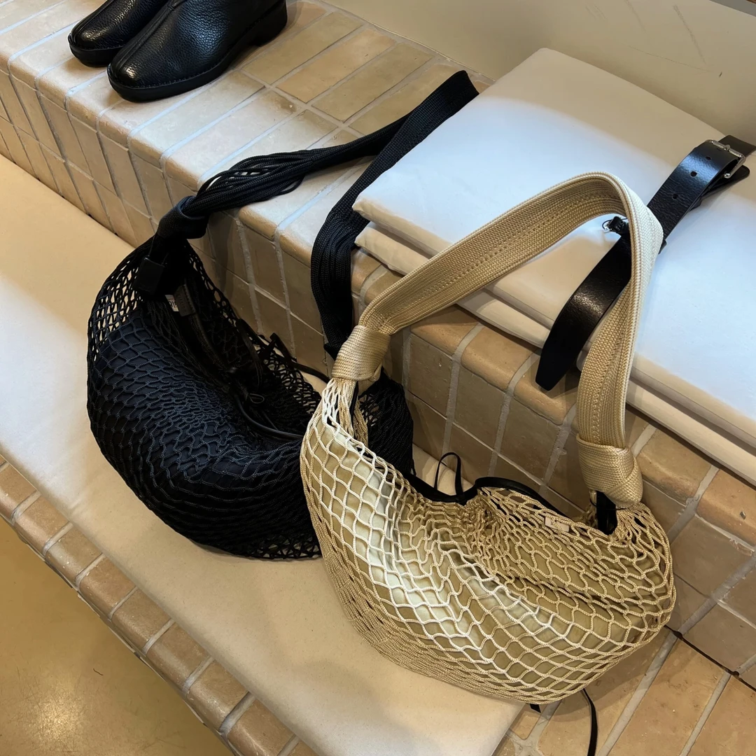 春夏新款渔网兜可颂牛角包中号斜挎慵懒腋下手提女