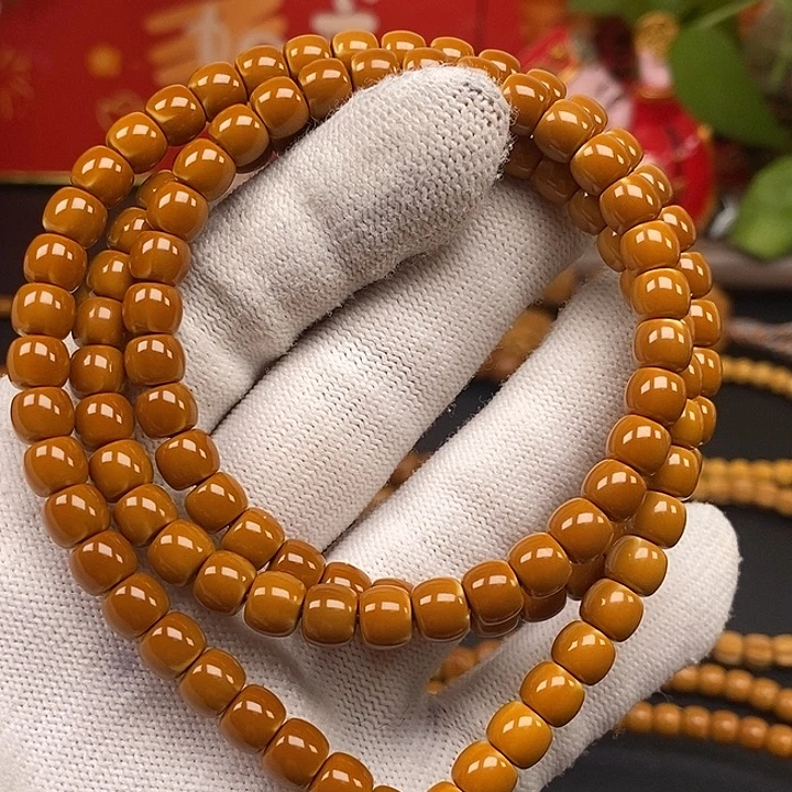 橄榄核手串6.6老挝核尖正三花极限弧108微白