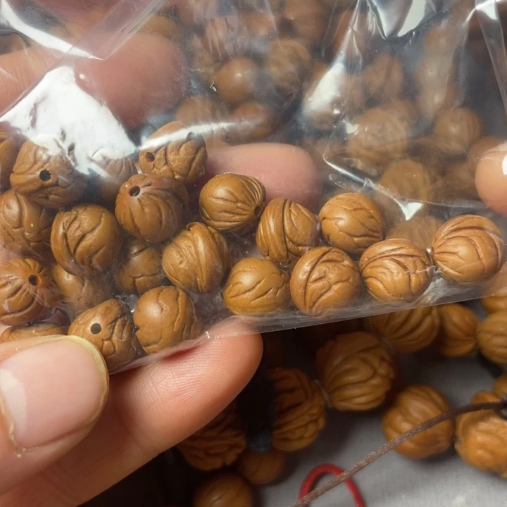 桃核吊坠?****二秦岭龙纹小龙纹随行10加18颗