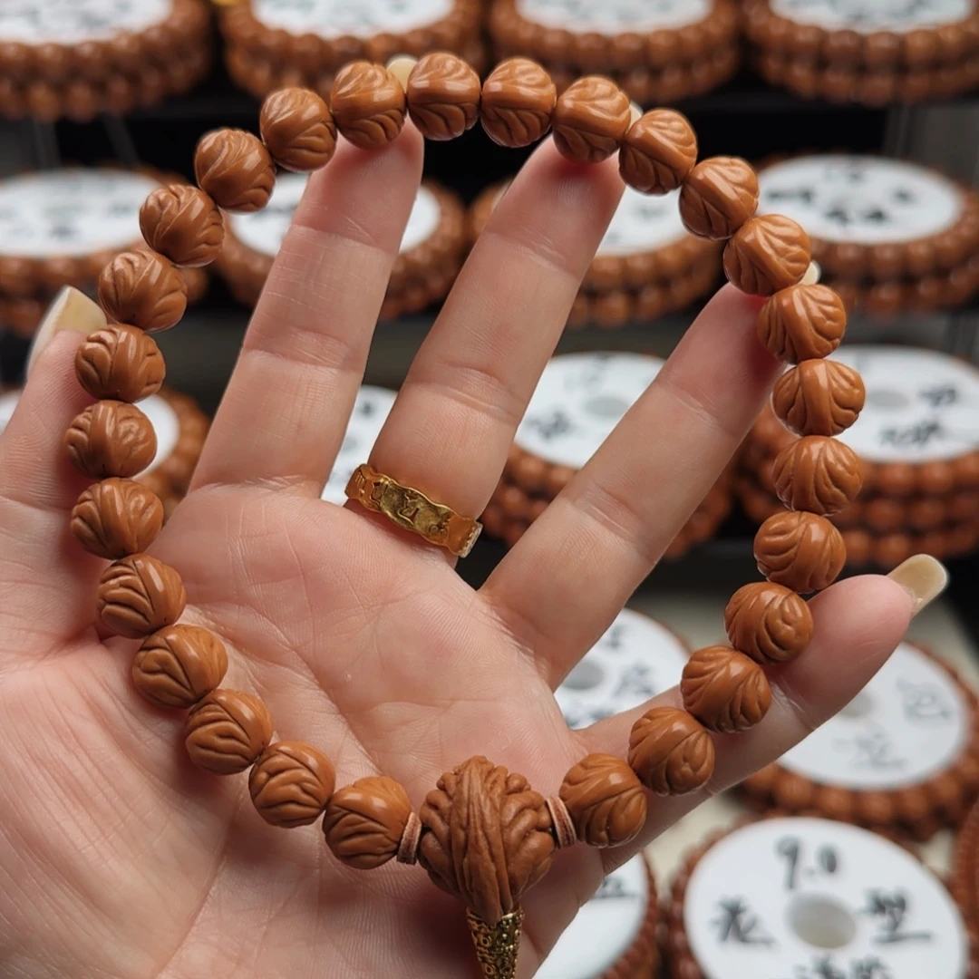 桃核手串元宝手持
