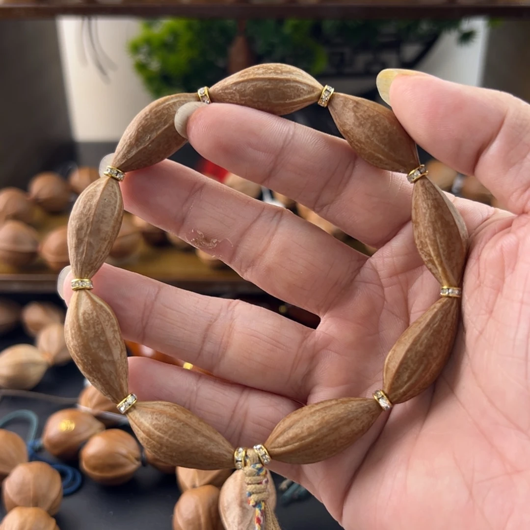 吊坠橄榄核梅林茶心核素串文玩手串小世界