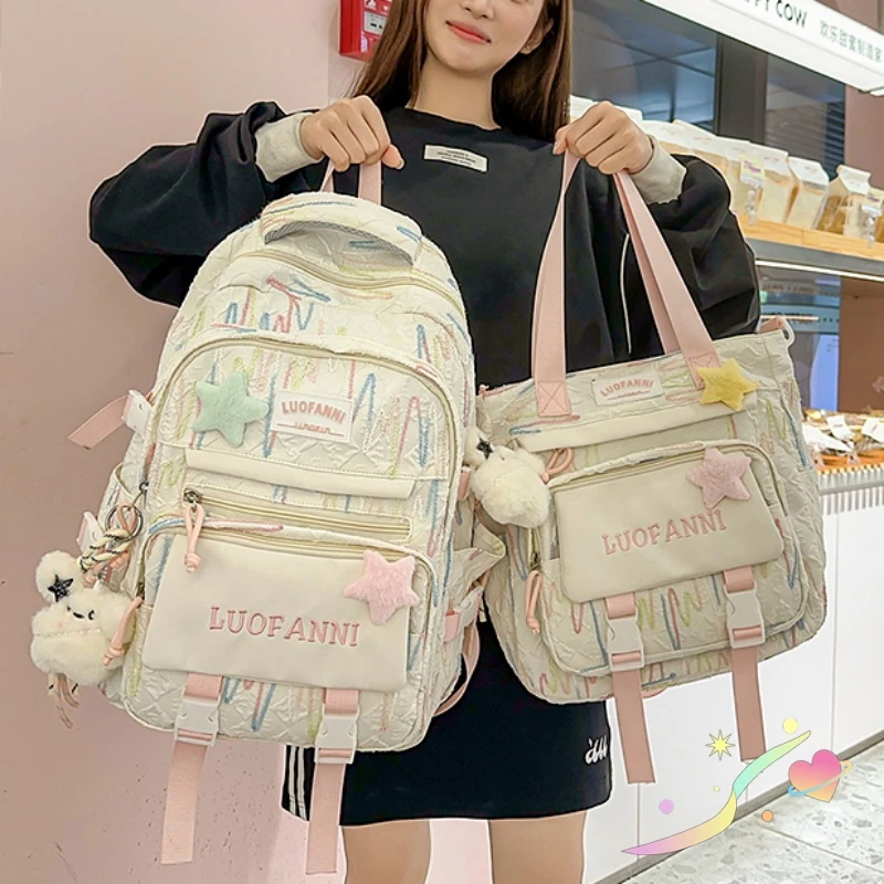 高颜值书包初中女生小学生2025新款大学生高中生大容量双肩背包女