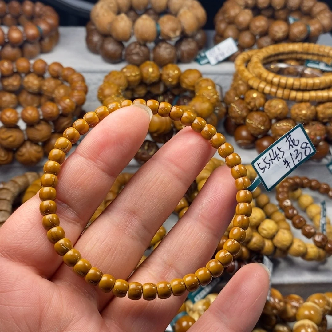 紫金鼠手串z**?紫金鼠纯肉鼓珠5.5