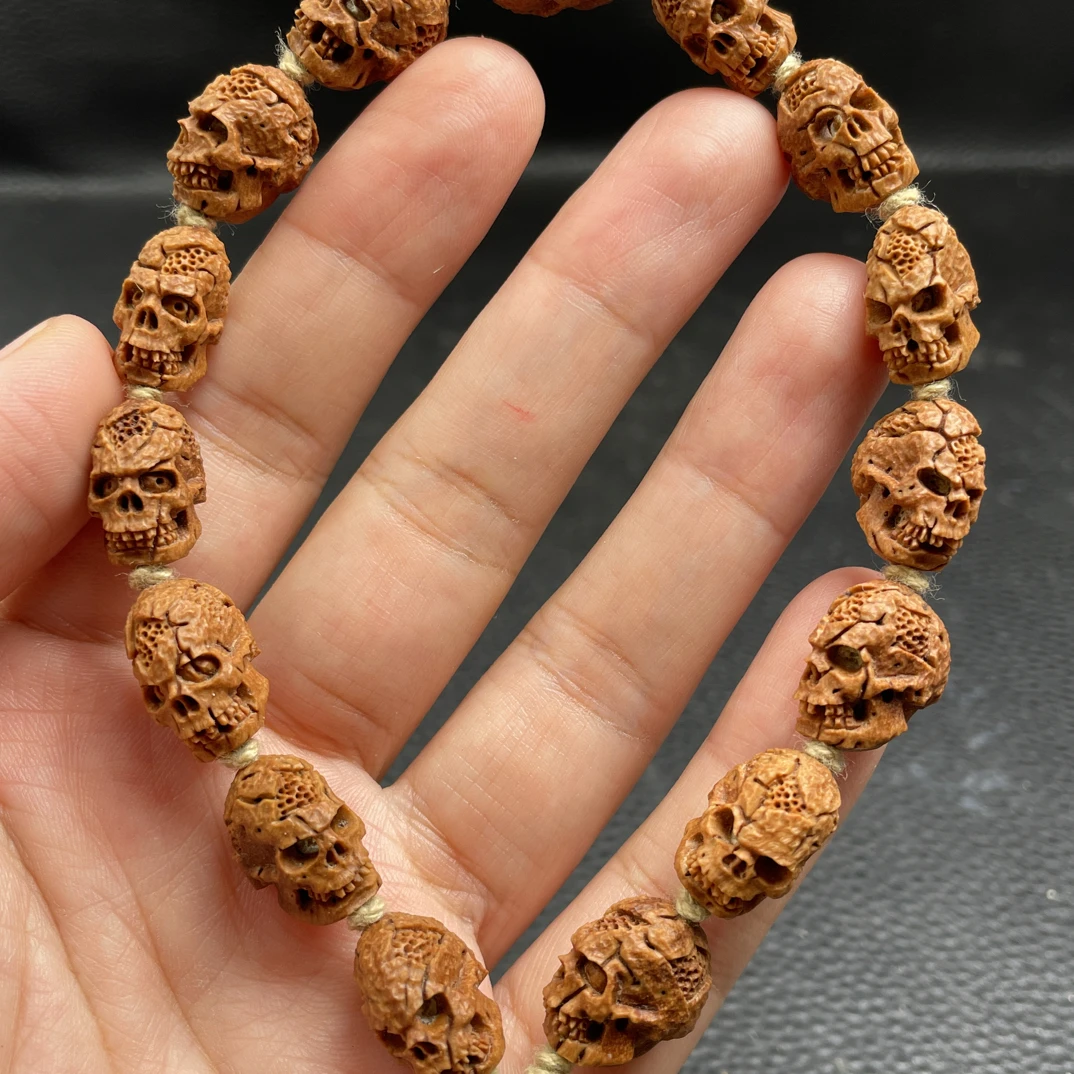 新款桃核1.0纯手工骷髅路路通手串